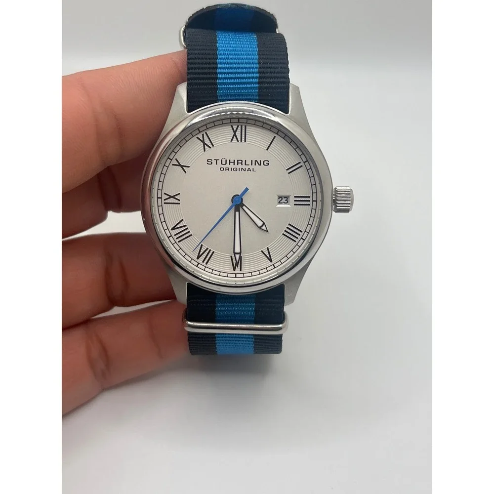 Stührling Original Men's Watch Silver Dial Roman Numerals Blue Stripe‎ Band